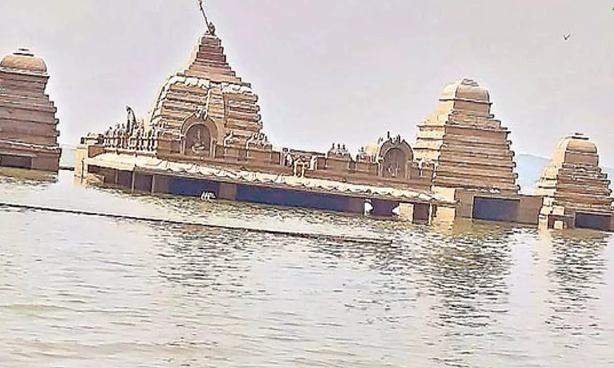 A view of partially surfaced Sangamehwara Swamy temple in the waters of Krishna river