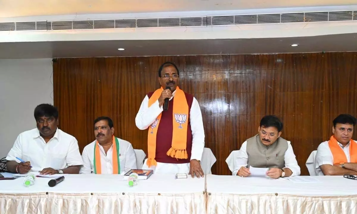 BJP State president Somu Veerraju speaking at the partys core committee meeting in Rajahmundry on Wednesday. Union Minister Devusinh Jesingbhai Chauhan is also seen.
