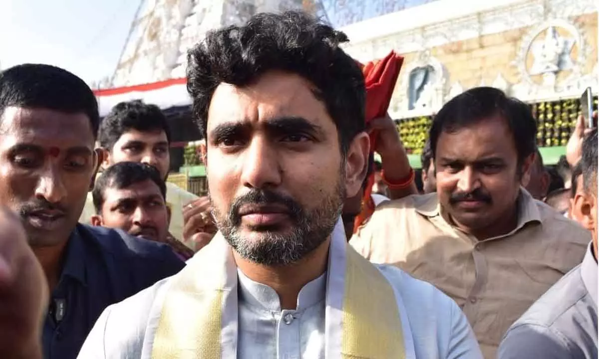 Nara Lokesh greets people after having darshan of Lord Venkateswara in Tirumala on Thursday