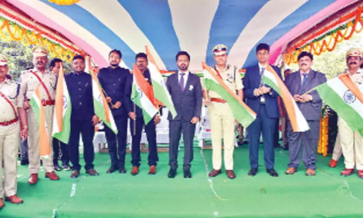 District Collector V Prasanna Venkatesh and other dignitaries participating in Republic Day celebrations at Police Parade grounds in Eluru on Thursday