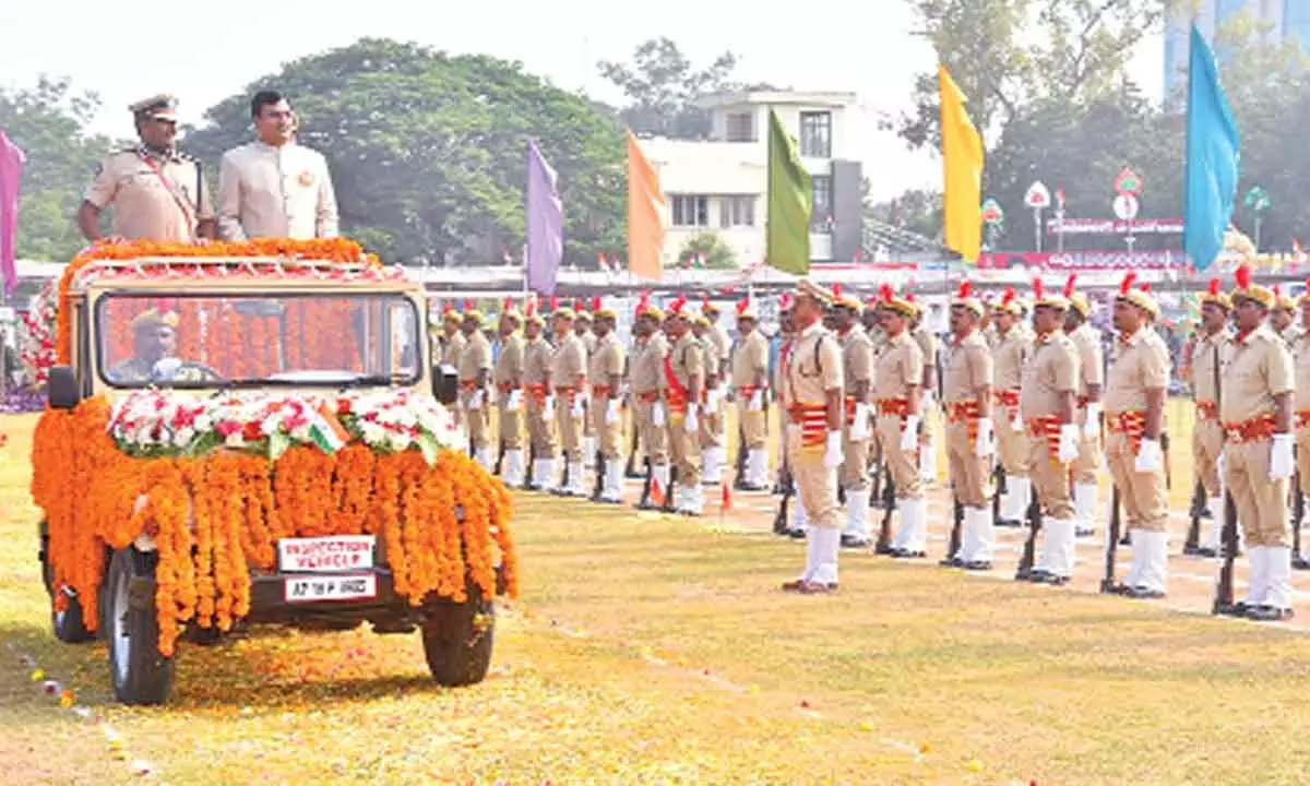 District Collector K V N Chakradhar Babu receiving guard of honour at Police Parade Grounds in Nellore on Thursday