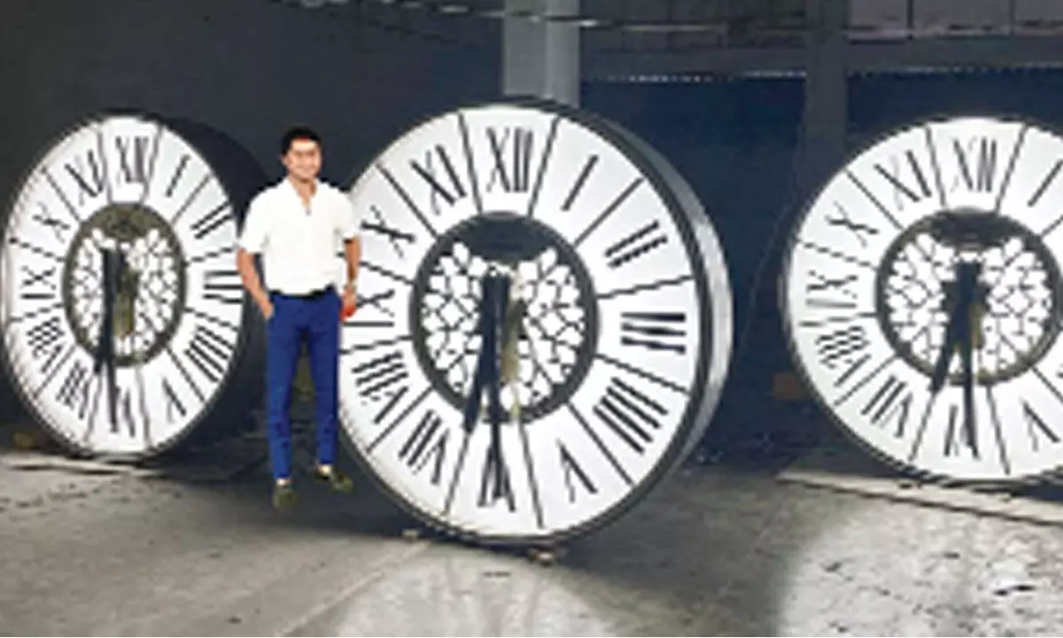 Young horologist adds innovative touch to clocks