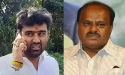 Suraj Revanna fields for his mother, bowls for his father and stumps his uncle