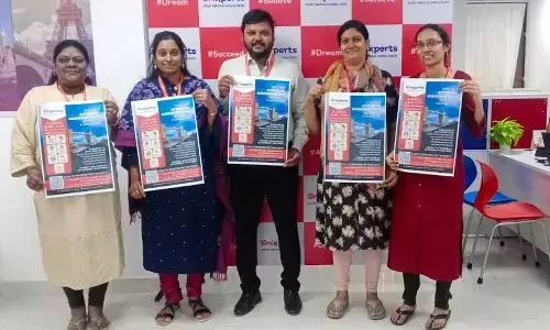Organisers launching a poster of the education fair in Visakhapatnam on Sunday