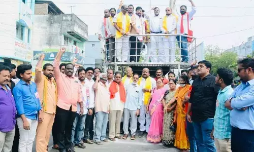 Leaders of all parties staging a protest at Mahatma Gandhi statue at Jampeta in Rajamahendravaram on Monday
