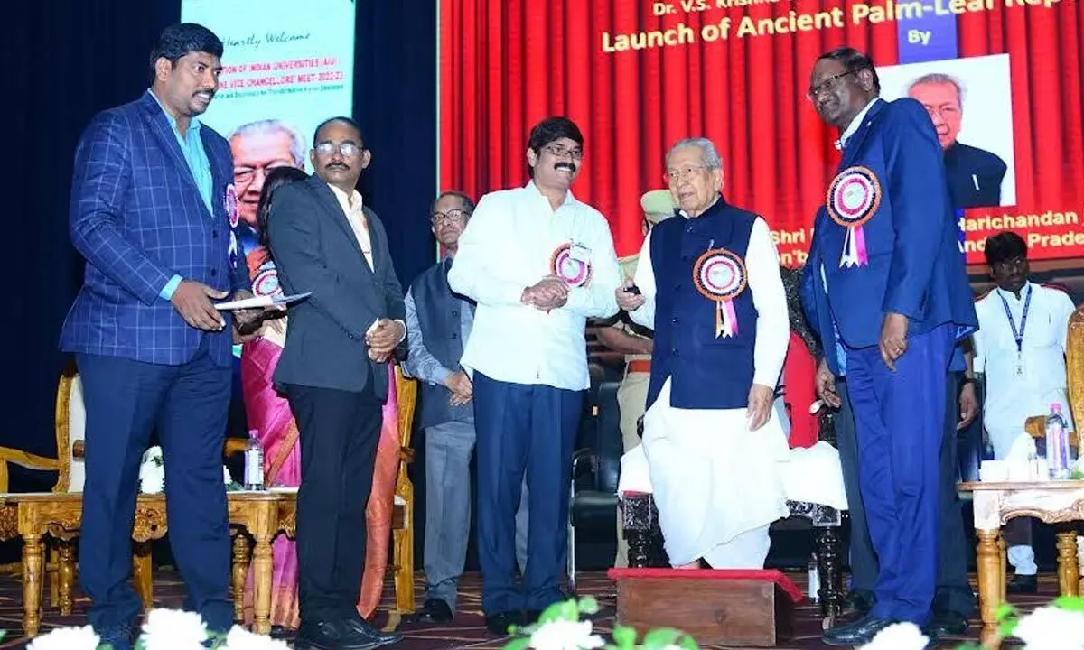 AP Governor Biswabhusan Harichandan uploading the digitalised ancient manuscripts at the AIU South Zone Vice-Chancellors Meet 2022-23 in Visakhapatnam on Tuesday