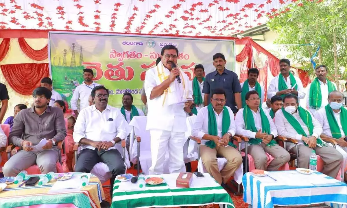 Agricultural Minister Singireddy Niranjan Reddy addressing a gathering after launching Ruythu Vedhika at a village in Khammam district on Wednesday