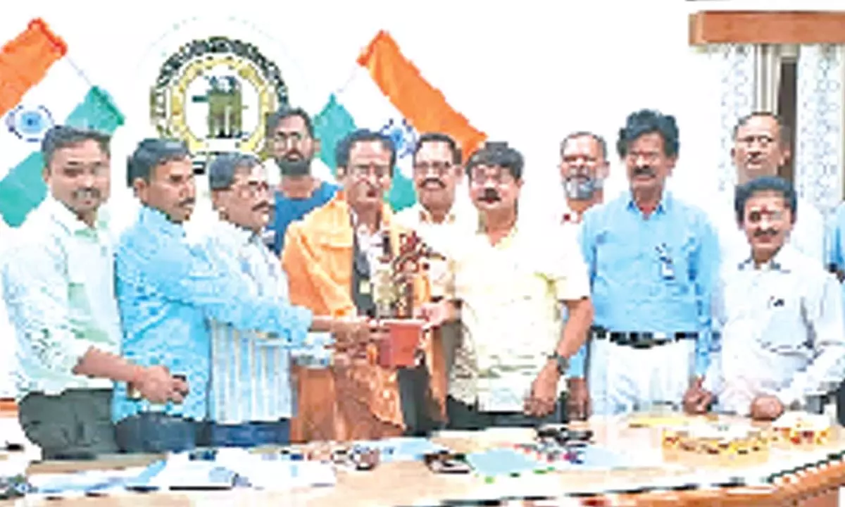 Singareni Tribal Employees Union leaders and workers felicitating newly appointed SCCL directors in Kothagduem on Wednesday