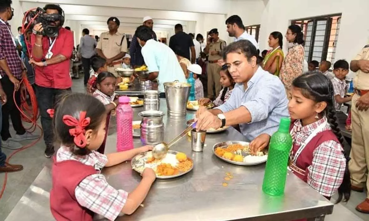 IT Minister KT Rama Rao having lunch with children at the inauguration of  KG to PG institute at Gambhiraopet mandal on Wednesday