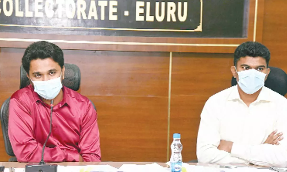 District Collector V Prasanna Venkatesh addressing a meeting at the Collectorate in Eluru on Wednesday