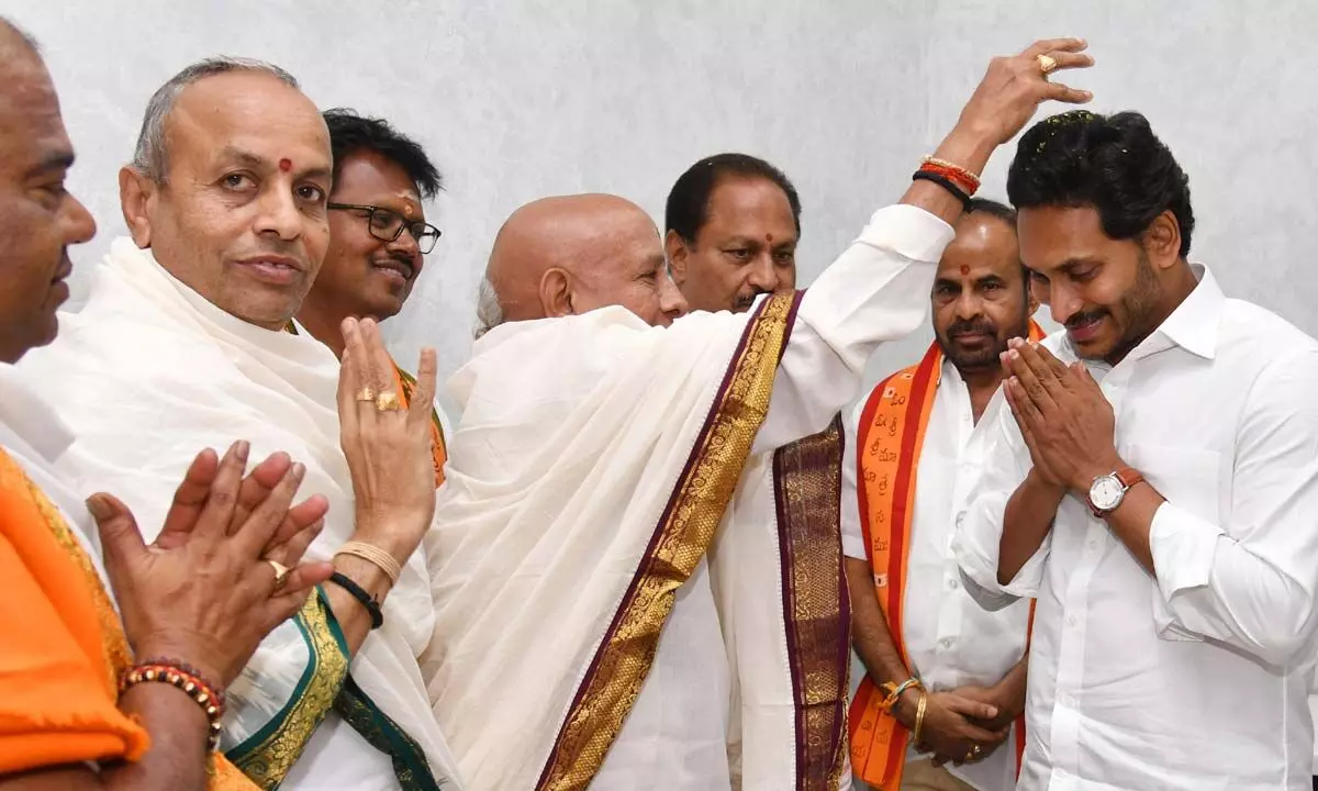 Sri Bhramaramba Mallikarjuna Swamy Devasthanam priests blessing Chief Minister Y S Jagan Mohan Reddy at his camp office in Tadepalli on Wednesday