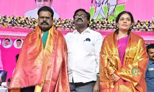 Minister Ajay Kumar felicitating the new AMC chairperson Dorepally Swetha after taking oath in Khammam on Wednesday