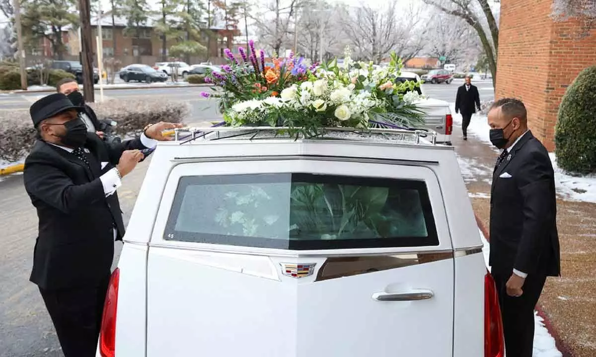 Flowers are secured on a hearse after a memorial service for Black motorist Tyre Nichols who died after being beaten by Memphis Police officers, in Memphis, Tennessee, US