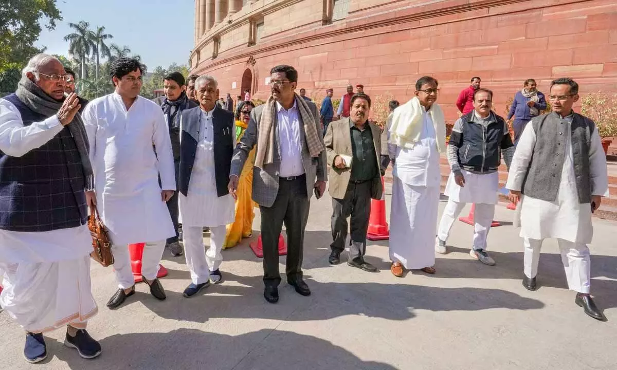 Opposition leader Mallikarjun Kharge and other MPs at Parliament House complex during ongoing Budget Session, in New Delhi on Thursday