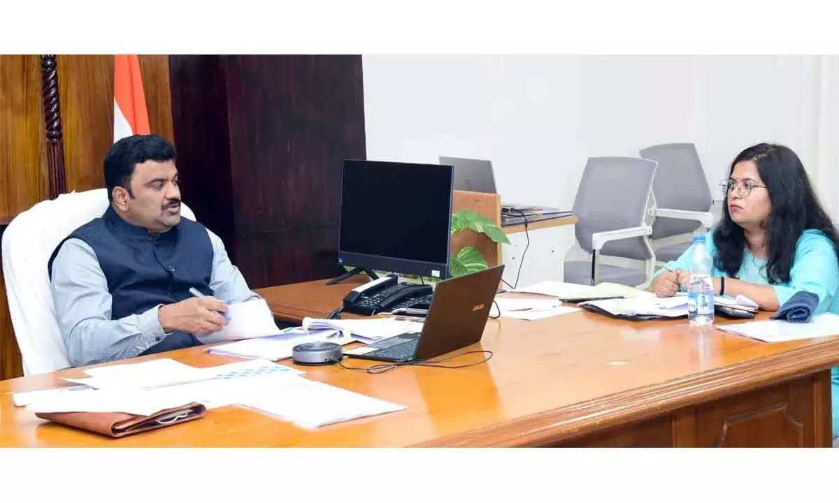Krishna district Collector P Ranjith Basha participating in a videoconference from Machilipatnam on Thursday