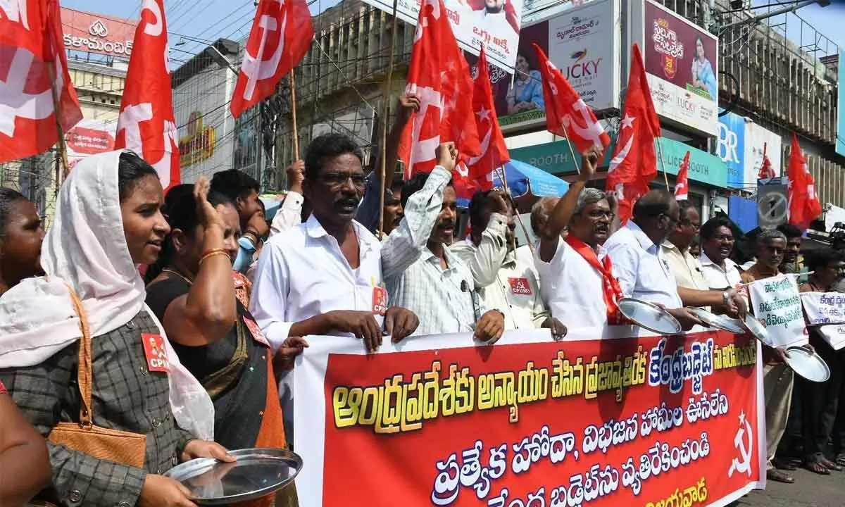 CPM State executive member Ch Babu Rao, party leaders and activists staging a protest against the Union Budget-2023 in Vijayawada on Thursday 	Photo: Ch Venkata Mastan