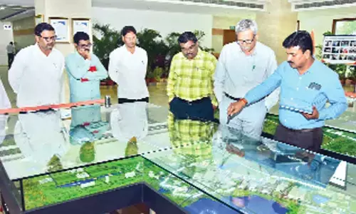 Telugu Ganga CE M Srinivasulu Reddy being briefed about Sri City by its Director Mukunda Reddy