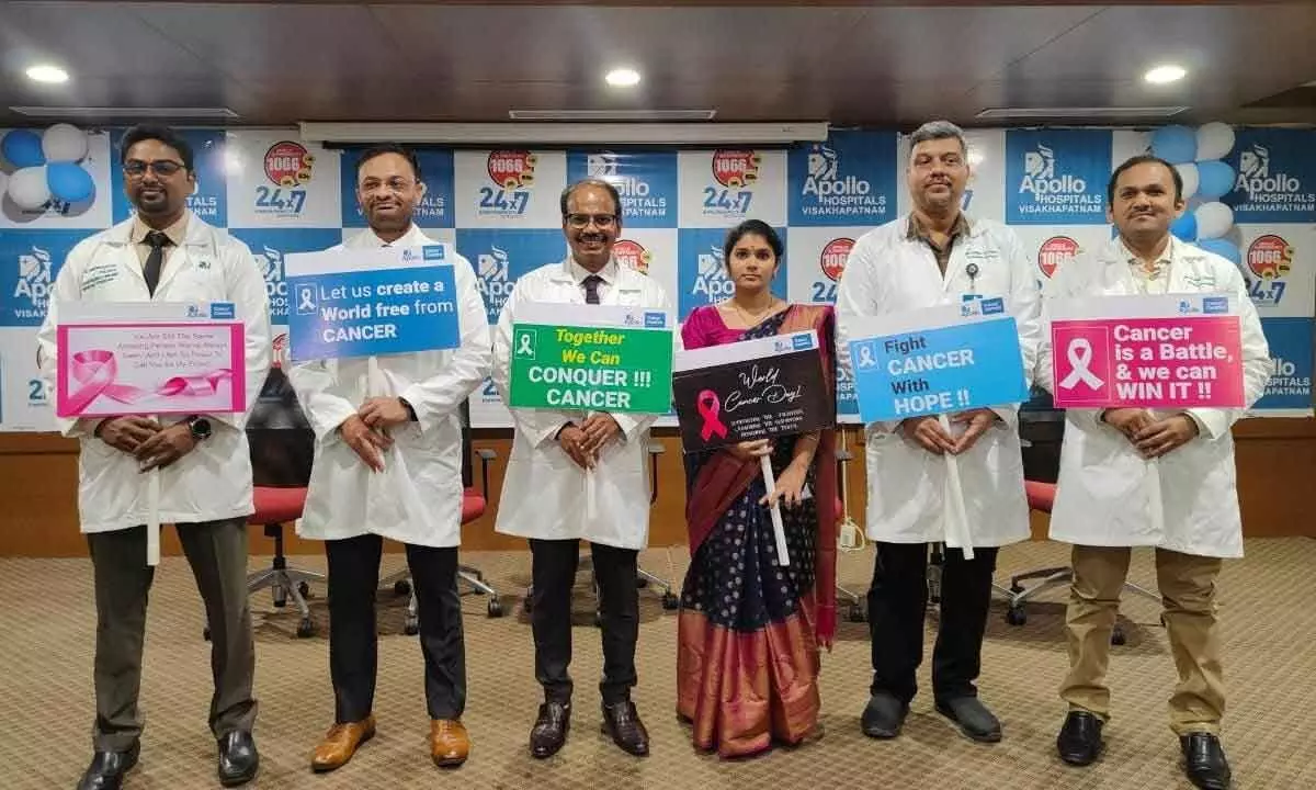 Holding placards, a team of doctors at Apollo Cancer Centres educate people on cancer awareness in Visakhapatnam on Friday