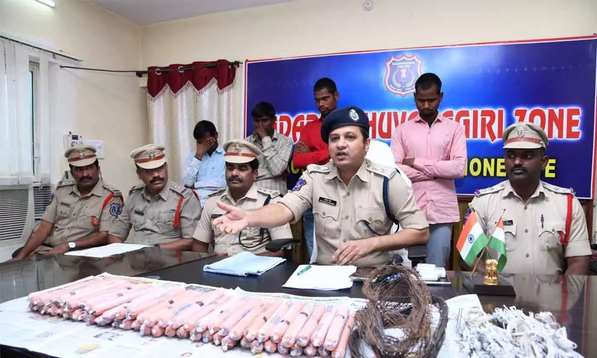 DCP Rajesh Chandra showing the seized explosives in a press meet in Bhongir. Arrested accused also seen