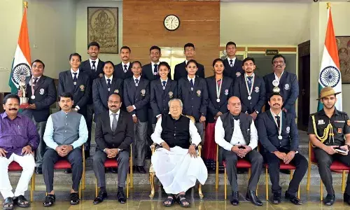 NSS programme officers and volunteers along with Governor Biswabhusan Harichandan at Raj Bhavan in Vijayawada on Friday