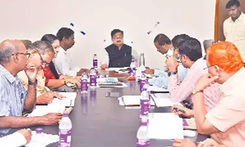 District Collector K Venkataramana Reddy addressing the DIEPC meeting in Tirupati on Friday