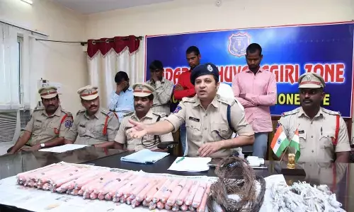 DCP Rajesh Chandra showing the seized explosives in a press meet in Bhongir. Arrested accused also seen