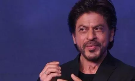 SRK showcases his wit as he responds to fan asking for 1 crore from his 700 crore collection