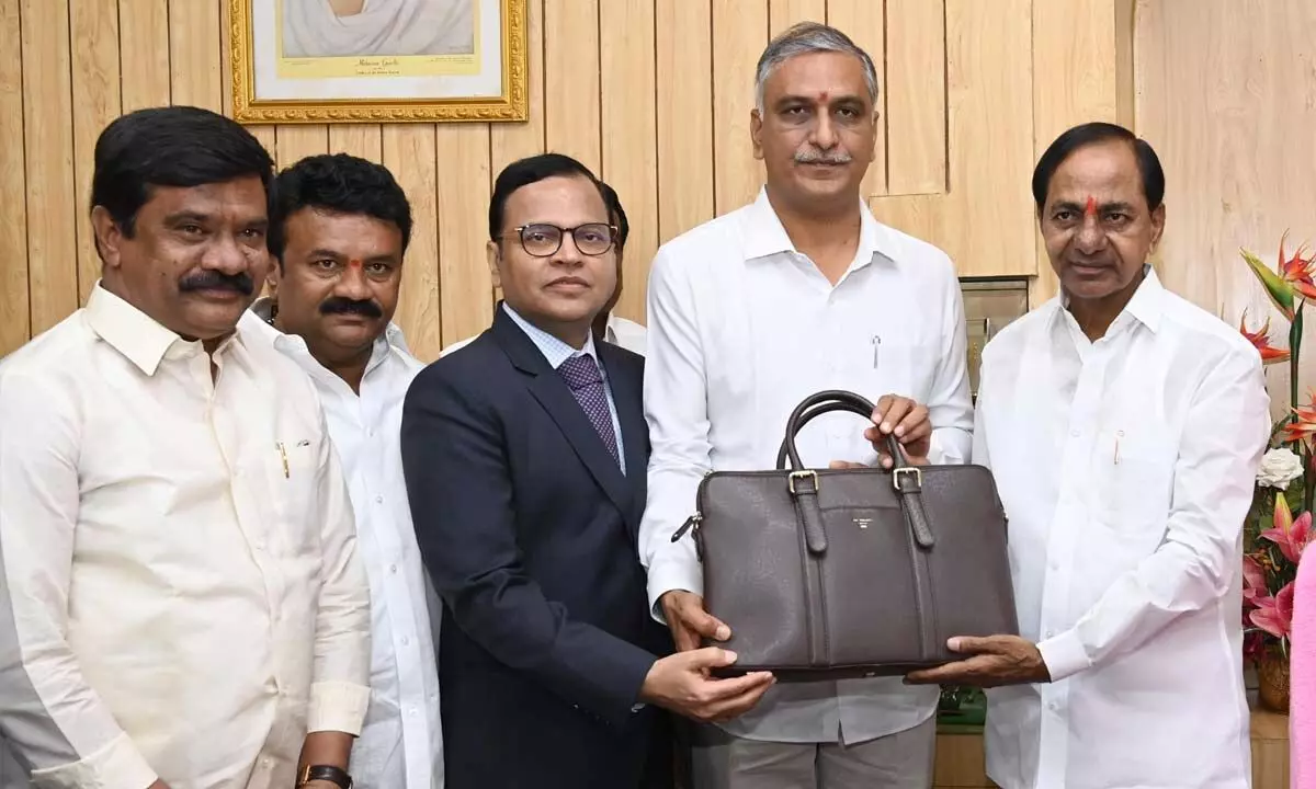 Finance Minister T Harish Rao with Chief Minister K Chandrashekar Rao before presenting the Budget 2023-24, at the Assembly in Hyderabad on Monday