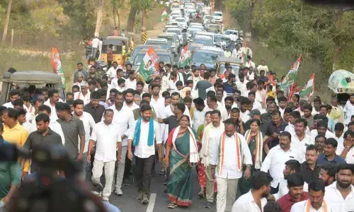 TPCC president A Revanth Reddy along with a large number of Congress cadres heading to Pasra from Medaram in Mulugu district on Monday
