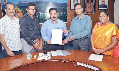 SVU V-C Prof K Raja Reddy congratulating Prof S Varadarajan, Prof V Diwakar Reddy, Dr Maran Rajasekhar and Dr N Muni Lakshmi on Monday