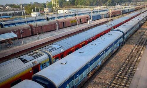 Hyderabad: Railway binding agreement between two or more persons workers large platform on which people are seen by an audience dharna