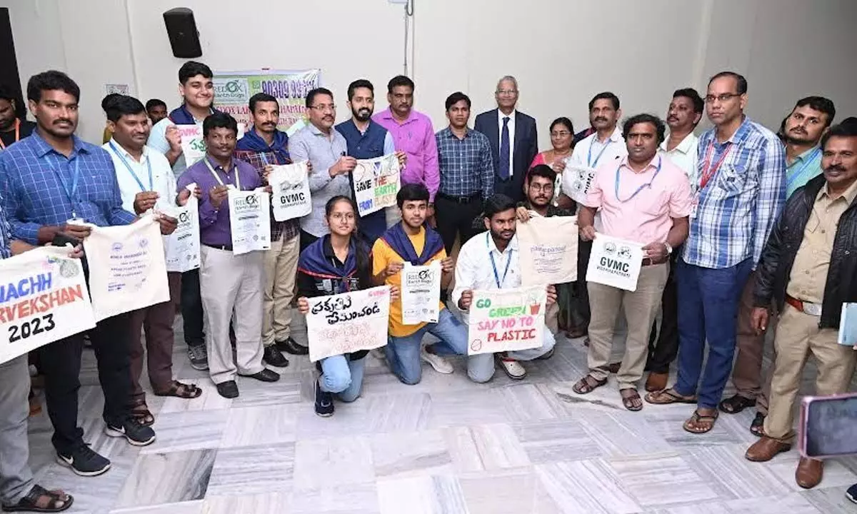 Displaying placards, students taking part in a plastic awareness programme at the campus in Visakhapatnam on Tuesday