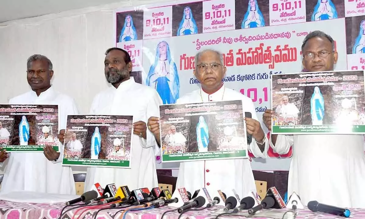 Bishop Thelagathoti J Raja Rao, vicar general Muvvala Prasad and festival committee members releasing posters of Gunadala Mary Matha shrine in Vijayawada on Tuesday  Photo: Ch Venkata Mastan