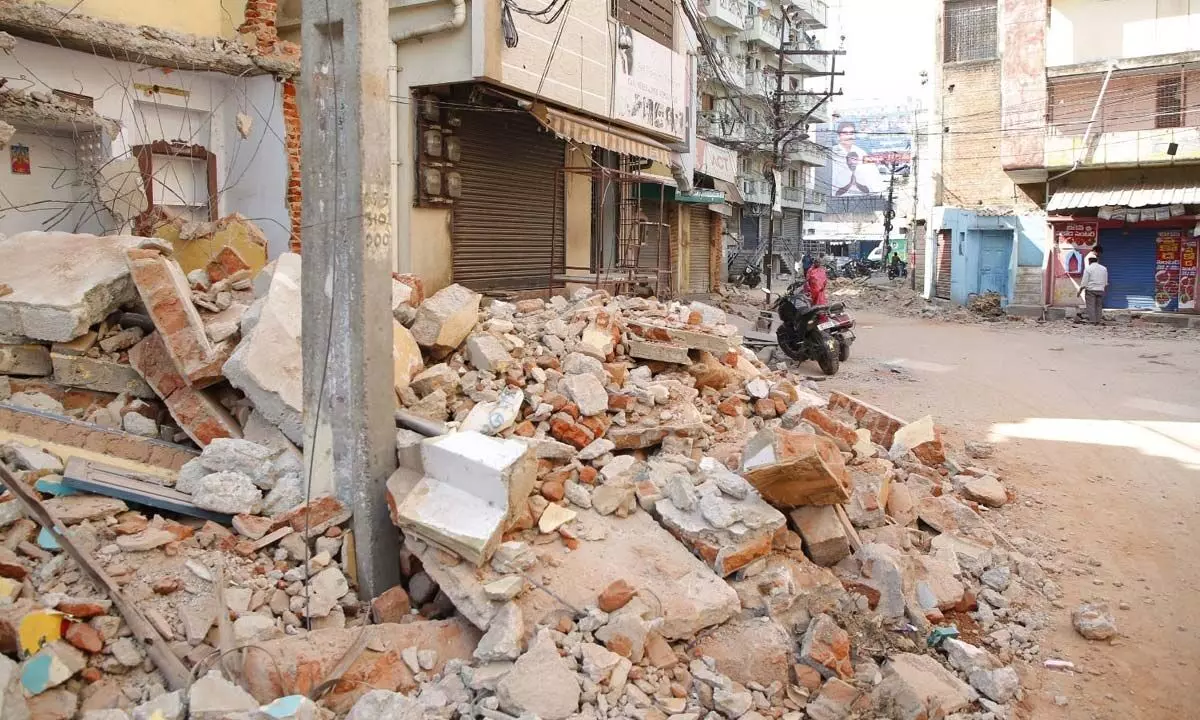 Partially demolished structures on Gangamma temple road in Tirupati