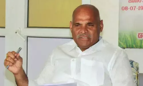 YSRCP MLA Kolusu Parthasarathy addressing a press conference at his office  in Vijayawada  on Tuesday