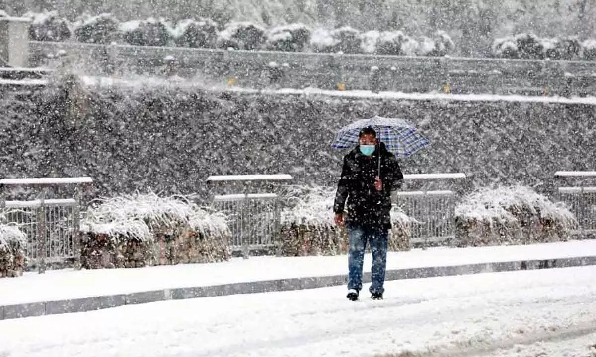 China renews alert for snowstorms