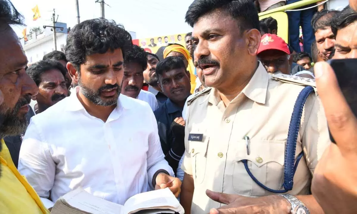 TDP national general secretary Nara Lokesh and former Minister N Amaranatha Reddy arguing with a police officer who denied permission for the party to hold  a public meeting at NTR circle in Chittoor rural mandal on Wednesday