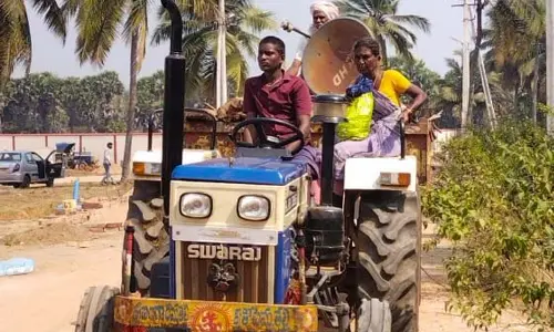 Locals of Rellipeta leaving for rehabilitation colony with their belongings on Wednesday