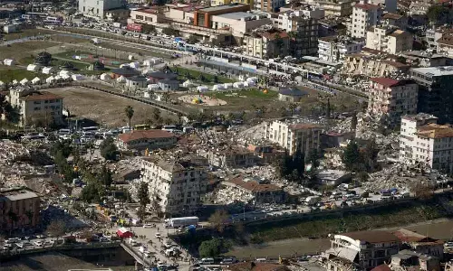 Quake toll soars past 11K