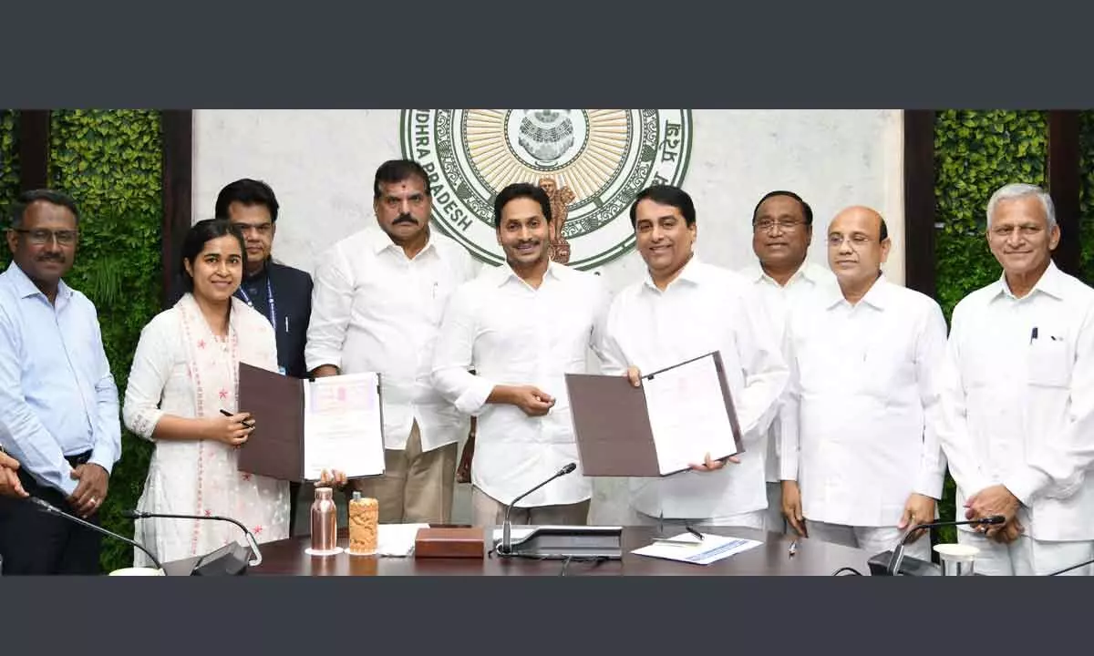 Sri Satya Sai Trust officials and midday meals officials exchange an agreement on supply of ragi malt to 38 lakh students of government schools by the trust, in the presence of Chief Minister Y S Jagan Mohan Reddy in Tadepalli on Thursday