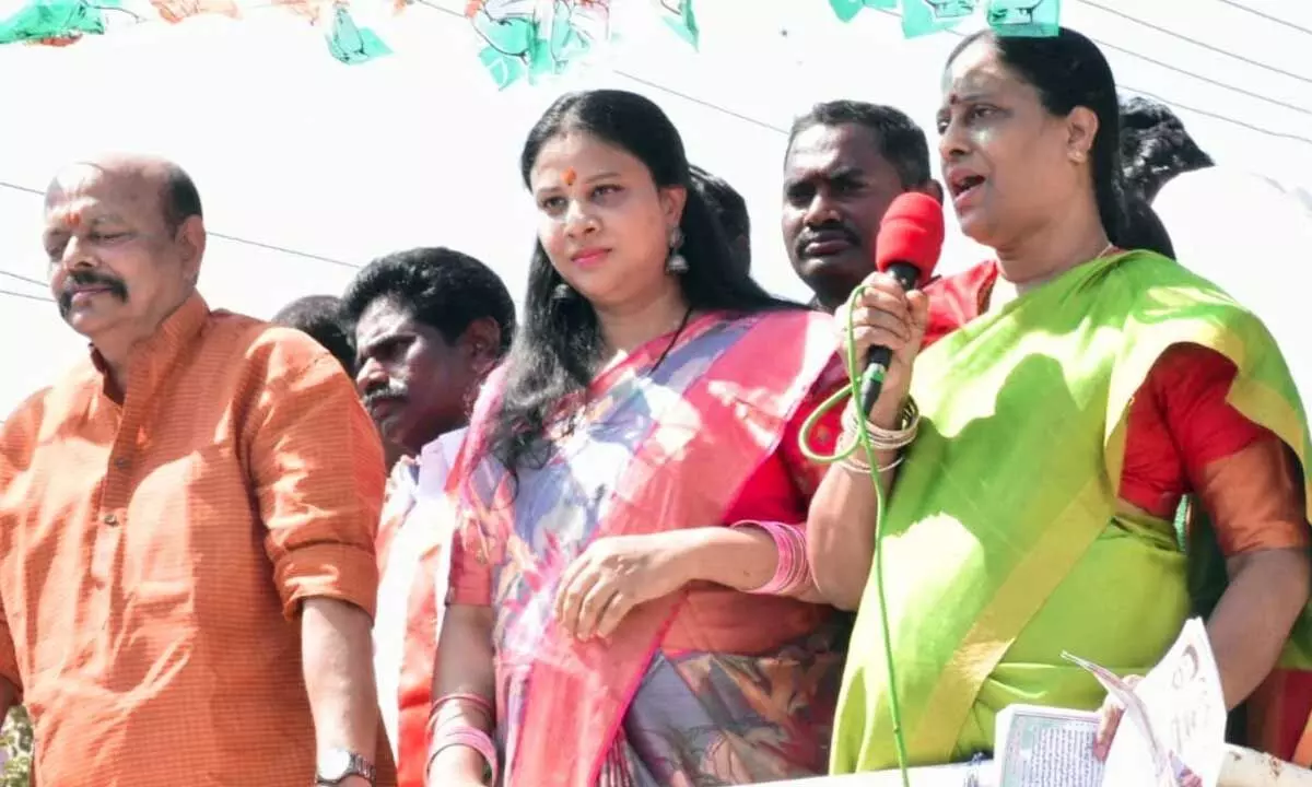 Former minister Konda Surekha addressing a gathering Warangal East constituency on Thursday. Surekhas husband and former MLC Konda Muralidhar Rao and daughter Susmitha Patel are also seen