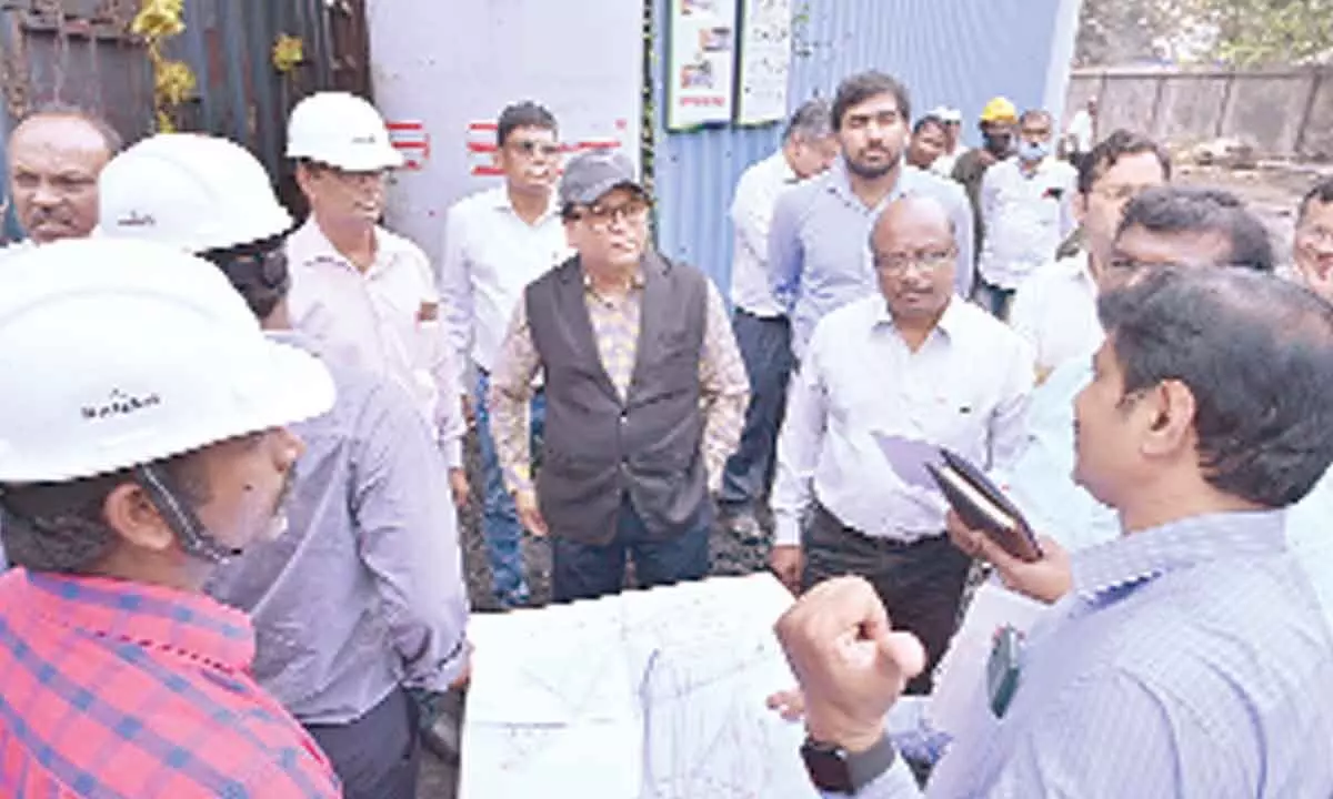 DRM Anup Satpathy along with the officials inspecting the railway siding of Visakhapatnam Port in Visakhapatnam on Thursday