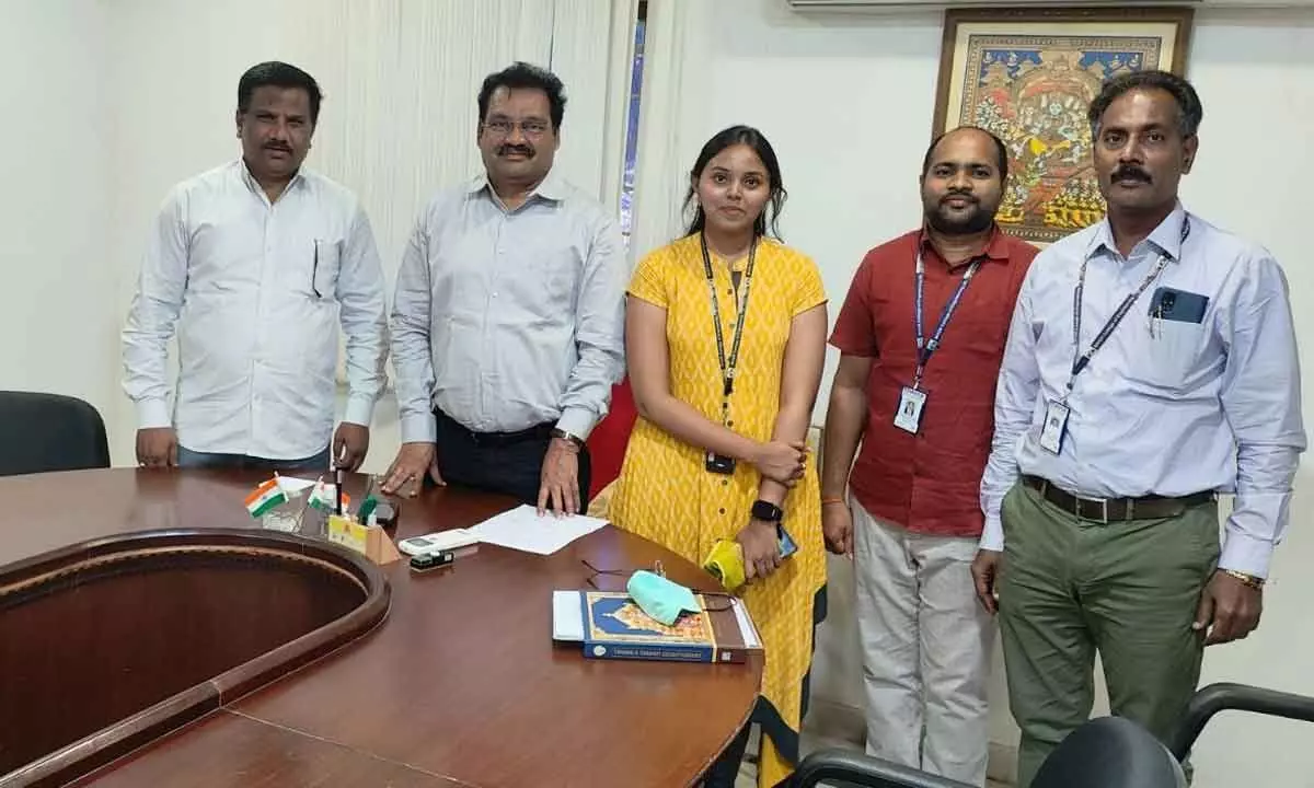 Officials MVGR College of Engineering (A) appreciating N Anusha for being selected for National Youth Parliament Festival