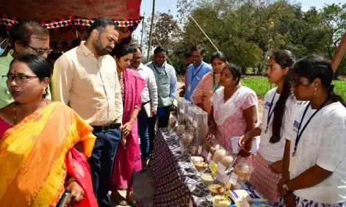 Collector RV Karnan inspects millets exhibition organised at the Agricultural Research Station in Karimnagar on Thursday