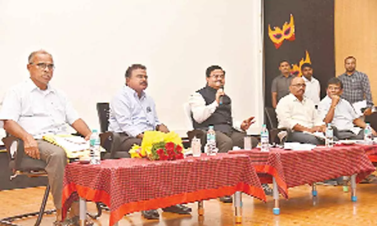 District Collector K Venkataramana Reddy addressing the headmasters, MEOs and Principals at a meeting in Tirupati on Friday.