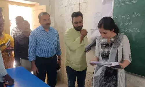 Municipal Commissioner Anupama Anjali inspecting arrangements for the MLC polls at a polling centre in Tirupati on Saturday
