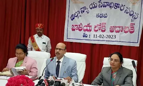 Principal Sessions District Judge Justice C N Murthy addressing the Lok Adalat in Kadapa on Saturday.