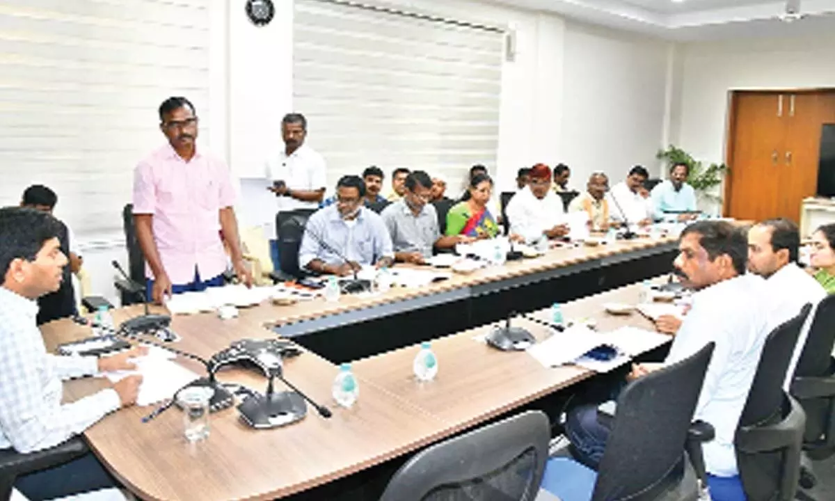 District Collector G Ravi Nayak interacting with the officials during a review meeting in Mahabubnagar on new industries