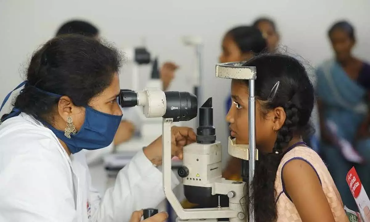 Visitors availing eye camp facility organised by Brandix at Atchutapuram in Anakapalli