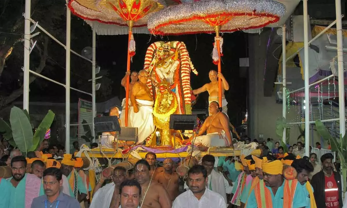 Lord Kalyana Venkateswara Swamy being taken out in a procession on Hamsa Vahanam at Srinivasa Mangapuram on Sunday evening